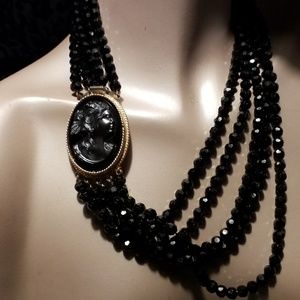 Black cameo multi strand resin bead necklace